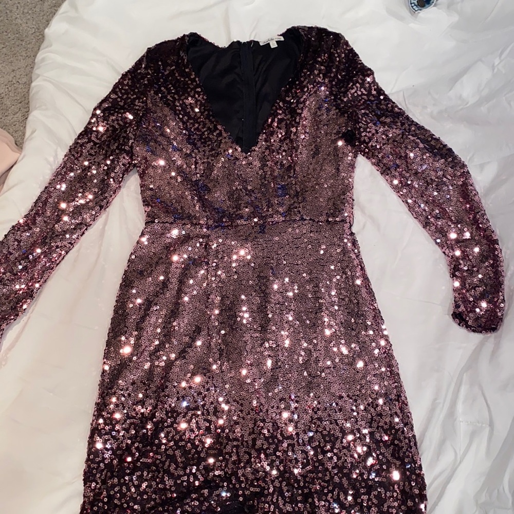 Charlotte russe, has a small tear in it.